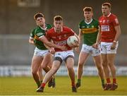 25 April 2022; Kelan Scannell of Cork in action against Dylan Geaney of Kerry during the EirGrid Munster GAA Football Under 20 Championship final match between Kerry and Cork at Austin Stack Park in Tralee, Kerry. Photo by Eóin Noonan/Sportsfile