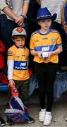 24 April 2022; Two young Clare supporters stand during the National Anthem before the Munster GAA Hurling Senior Championship Round 2 match between Tipperary and Clare at FBD Semple Stadium in Thurles, Tipperary. Photo by Ray McManus/Sportsfile