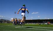 24 April 2022; Noel McGrath of Tipperary runs out on to the pitch before the Munster GAA Hurling Senior Championship Round 2 match between Tipperary and Clare at FBD Semple Stadium in Thurles, Tipperary. Photo by Ray McManus/Sportsfile