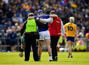 24 April 2022; John McGrath of Tipperary is assisted off the field during the Munster GAA Hurling Senior Championship Round 2 match between Tipperary and Clare at FBD Semple Stadium in Thurles, Tipperary. Photo by Ray McManus/Sportsfile