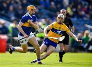 24 April 2022; Mark Kehoe of Tipperary is tackled by Ryan Taylor of Clare during the Munster GAA Hurling Senior Championship Round 2 match between Tipperary and Clare at FBD Semple Stadium in Thurles, Tipperary. Photo by Ray McManus/Sportsfile