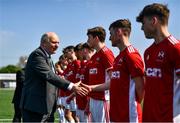 26 April 2022; FAI president Gerry McAnaney shakes hands with Queen's University Belfast players before the Collingwood Cup Final match between UCD and Queens University Belfast at Oriel Park in Dundalk, Louth. Photo by Ben McShane/Sportsfile