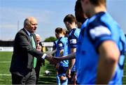 26 April 2022; FAI president Gerry McAnaney shakes hands with UCD players before the Collingwood Cup Final match between UCD and Queens University Belfast at Oriel Park in Dundalk, Louth. Photo by Ben McShane/Sportsfile