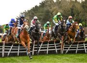 26 April 2022; Runners and riders jump the last on their first time round during the Killashee Hotel Handicap Hurdle during day one of the Punchestown Festival at Punchestown Racecourse in Kildare. Photo by David Fitzgerald/Sportsfile