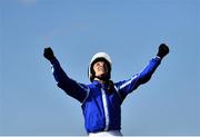 26 April 2022; Jockey Paul Townend celebrates on Energumene after they won the William Hill Champion Steeplechase during day one of the Punchestown Festival at Punchestown Racecourse in Kildare. Photo by David Fitzgerald/Sportsfile