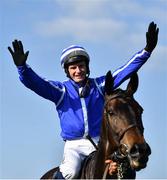 26 April 2022; Jockey Paul Townend celebrates on Energumene after they won the William Hill Champion Steeplechase during day one of the Punchestown Festival at Punchestown Racecourse in Kildare. Photo by David Fitzgerald/Sportsfile
