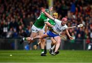 23 April 2022; Calum Lyons of Waterford is tackled by William O'Donoghue of Limerick during the Munster GAA Hurling Senior Championship Round 2 match between Limerick and Waterford at TUS Gaelic Grounds in Limerick. Photo by Ray McManus/Sportsfile