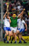23 April 2022; Cathal O'Neill of Limerick is tackled by Tom Barron, left, and Shane McNulty of Waterford during the Munster GAA Hurling Senior Championship Round 2 match between Limerick and Waterford at TUS Gaelic Grounds in Limerick. Photo by Ray McManus/Sportsfile