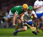 23 April 2022; Tom Barron of Waterford is tackled by Tom Morrisey of Limerick during the Munster GAA Hurling Senior Championship Round 2 match between Limerick and Waterford at TUS Gaelic Grounds in Limerick. Photo by Ray McManus/Sportsfile