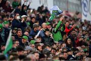 23 April 2022; Limerick supporters celebrate a score during the Munster GAA Hurling Senior Championship Round 2 match between Limerick and Waterford at TUS Gaelic Grounds in Limerick. Photo by Ray McManus/Sportsfile