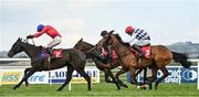 27 April 2022; Crosshill, right, with Robbie Power up, trails eventual second place Classic Getaway, left, with Danny Mullins up, and Fils d'Oudairies, behind, with Nico de Boinville up, on their way to winning the Louis Fitzgerald Hotel Hurdle during day two of the Punchestown Festival at Punchestown Racecourse in Kildare. Photo by Seb Daly/Sportsfile