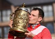27 April 2022; Paul Townend celebrates with the Gold Cup after winning the Ladbrokes Punchestown Gold Cup during day two of the Punchestown Festival at Punchestown Racecourse in Kildare. Photo by David Fitzgerald/Sportsfile