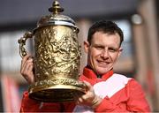 27 April 2022; Paul Townend celebrates with the Gold Cup after winning the Ladbrokes Punchestown Gold Cup during day two of the Punchestown Festival at Punchestown Racecourse in Kildare. Photo by David Fitzgerald/Sportsfile