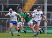 27 April 2022; Cian Scully of Limerick in action against Rory Furlong, left, and Joe Booth of Waterford during the oneills.com Munster GAA Hurling U20 Championship Semi-Final match between Limerick and Waterford at TUS Gaelic Grounds in Limerick, Ireland. Photo by Michael P Ryan/Sportsfile