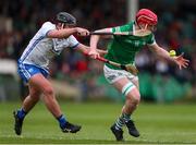 27 April 2022; Donnacha O'Dalaigh of Limerick in action against Colin Foley of Waterford during the oneills.com Munster GAA Hurling U20 Championship Semi-Final match between Limerick and Waterford at TUS Gaelic Grounds in Limerick, Ireland. Photo by Michael P Ryan/Sportsfile