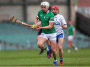 27 April 2022; Jimmy Quilty of Limerick in action against Seamus Fitzgerald of Waterford during the oneills.com Munster GAA Hurling U20 Championship Semi-Final match between Limerick and Waterford at TUS Gaelic Grounds in Limerick, Ireland. Photo by Michael P Ryan/Sportsfile
