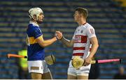27 April 2022; Colm Fogarty of Tipperary and Brion Saunderson of Cork exchange a handshake after the oneills.com Munster GAA Hurling U20 Championship semi-final match between Tipperary and Cork at FBD Semple Stadium in Thurles, Tipperary. Photo by Diarmuid Greene/Sportsfile