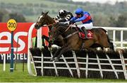 28 April 2022; Broomfield Hall, left, with Luke Dempsey up, jumps the last on their way to winning the Specialist Joinery Group Handicap Hurdle, from second place Gin Coco, right, with Jonathan Burke up, during day three of the Punchestown Festival at Punchestown Racecourse in Kildare. Photo by Seb Daly/Sportsfile