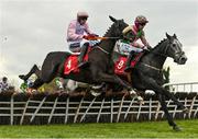 28 April 2022; Cafe Con Leche, left, with Keith Donoghue up, and Ideal Pal, right, with Jordan Gainfield up, jump the first during the Specialist Joinery Group Handicap Hurdle on day three of the Punchestown Festival at Punchestown Racecourse in Kildare. Photo by Seb Daly/Sportsfile