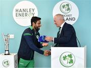 28 April 2022; Ireland cricketer Simi Singh, left, is presented with his ICC ODI Team of the Year cap by Ross McCollum, Cricket Ireland Chairman, during the Ireland’s International Cricket Season Launch at HBV Studios in Dublin. Photo by Sam Barnes/Sportsfile