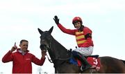 28 April 2022; Jockey Paul Townend and groom David Porter celebrate after winning the Ladbrokes Champion Stayers Hurdle Steeplechase with Klassical Dream during day three of the Punchestown Festival at Punchestown Racecourse in Kildare. Photo by Seb Daly/Sportsfile