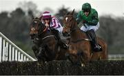 28 April 2022; Blue Lord, right, with Paul Townend up, jumps the last on their way to winning the Barberstown Castle Novice Steeplechase, from second place Coeur Sublime, left, with Rachael Blackmore up, during day three of the Punchestown Festival at Punchestown Racecourse in Kildare. Photo by Seb Daly/Sportsfile