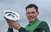 28 April 2022; Jockey Paul Townend with the trophy after winning the Barberstown Castle Novice Steeplechase on Blue Lord during day three of the Punchestown Festival at Punchestown Racecourse in Kildare. Photo by Seb Daly/Sportsfile