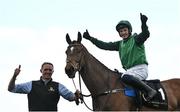 28 April 2022; Jockey Paul Townend and groom David Porter celebrate after winning the Barberstown Castle Novice Steeplechase with Blue Lord during day three of the Punchestown Festival at Punchestown Racecourse in Kildare. Photo by Seb Daly/Sportsfile