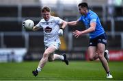 28 April 2022; Adam Fanning of Kildare in action against Harry Donaghy of Dublin during the EirGrid Leinster GAA Football U20 Championship Final match between Dublin and Kildare at MW Hire O'Moore Park in Portlaoise, Laois. Photo by Ben McShane/Sportsfile