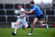 28 April 2022; Adam Fanning of Kildare in action against Harry Donaghy of Dublin during the EirGrid Leinster GAA Football U20 Championship Final match between Dublin and Kildare at MW Hire O'Moore Park in Portlaoise, Laois. Photo by Ben McShane/Sportsfile