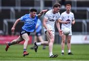 28 April 2022; James McGrath of Kildare in action against Sean Kinsella of Dublin during the EirGrid Leinster GAA Football U20 Championship Final match between Dublin and Kildare at MW Hire O'Moore Park in Portlaoise, Laois. Photo by Ben McShane/Sportsfile