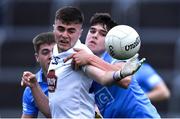 28 April 2022; Aaron Browne of Kildare in action against Theo Clancy of Dublin during the EirGrid Leinster GAA Football U20 Championship Final match between Dublin and Kildare at MW Hire O'Moore Park in Portlaoise, Laois. Photo by Ben McShane/Sportsfile