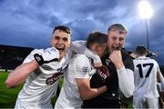 28 April 2022; Kildare players, from left, Niall O'Regan, Mark Maguire and goalkeeper Cian Burke celebrate after the EirGrid Leinster GAA Football U20 Championship Final match between Dublin and Kildare at MW Hire O'Moore Park in Portlaoise, Laois. Photo by Ben McShane/Sportsfile