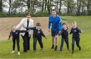 29 April 2022; Minister for Education Norma Foley TD and Minister of State for Sport and the Gaeltacht Jack Chambers TD, with students, from left, Emilia Spyrka, Dylan McCarthy, Oscar Paskevicius and Odhran O’Sullivan on a visit to Nagle Rice Primary School, Ballyoughtragh North in Kerry, while visiting local schools to support children taking part in ‘the Daily Mile'. Photo by Domnick Walsh/Sportsfile