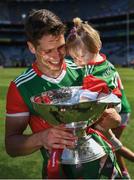 25 July 2021; Reflected glory. The Connacht final is relocated to Croke Park to accommodate a crowd of 18,000 and the switch suits Mayo just fine, as can be gleaned from a beaming Lee Keegan with his 14-month-old daughter Líle and the Nestor Cup. This is not the first time the Connacht decider moved west to east as the replayed 1922 final between Galway and Sligo took place on Jones' Road in September 1923. Photo by Ray McManus/Sportsfile This image may be reproduced free of charge when used in conjunction with a review of the book &quot;A Season of Sundays 2020&quot;. All other usage © Sportsfile