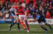 29 April 2022; Ben Healy of Munster is tackled by Jarrod Evans of Cardiff Blues during the United Rugby Championship match between Munster and Cardiff at Musgrave Park in Cork. Photo by Brendan Moran/Sportsfile
