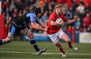 29 April 2022; Ben Healy of Munster is tackled by Seb Davies of Cardiff Blues during the United Rugby Championship match between Munster and Cardiff at Musgrave Park in Cork. Photo by Brendan Moran/Sportsfile
