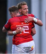 29 April 2022; Mike Haley of Munster, right, celebrates with teammate Rory Scannell after scoring their side's second try during the United Rugby Championship match between Munster and Cardiff at Musgrave Park in Cork. Photo by Brendan Moran/Sportsfile