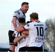 29 April 2022; Dundalk players including Andy Boyle, top, and Greg Sloggett, celebrate their side's first goal scored by Darragh Leahy during the SSE Airtricity League Premier Division match between Dundalk and Drogheda United at Oriel Park in Dundalk, Louth. Photo by Michael P Ryan/Sportsfile