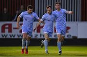29 April 2022; Cameron Dummigan of Derry City, centre, celebrates with teammates Patrick McEleney, left, and Cameron McJannet after scoring their side's fourth goal during the SSE Airtricity League Premier Division match between St Patrick's Athletic and Derry City at Richmond Park in Dublin. Photo by Seb Daly/Sportsfile