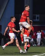 29 April 2022; Craig Casey of Munster, right, celebrates with team-mates Calvin Nash, left, and Alex Kendellen after scoring his side's fourth try during the United Rugby Championship match between Munster and Cardiff at Musgrave Park in Cork. Photo by Sam Barnes/Sportsfile