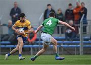 30 April 2022; Aaron Griffin of Clare in action against Michael Donovan of Limerick during the Munster GAA Senior Football Championship Quarter-Final match between Clare and Limerick at Cusack Park in Ennis, Clare. Photo by Piaras Ó Mídheach/Sportsfile