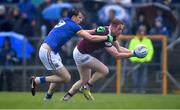 30 April 2022; Jamie Gonoud of Westmeath in action against Darren Gallagher of Longford during the Leinster GAA Football Senior Championship Quarter-Final match between Westmeath and Longford at TEG Cusack Park in Mullingar, Westmeath. Photo by Ben McShane/Sportsfile