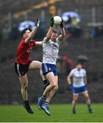 30 April 2022; Kieran Hughes of Monaghan in action against Odhran Murdock of Down during the Ulster GAA Football Senior Championship Quarter-Final match between Monaghan and Down at St Tiernach’s Park in Clones, Monaghan. Photo by David Fitzgerald/Sportsfile