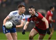 30 April 2022; Seán Jones of Monaghan in action against Peter Fegan of Down during the Ulster GAA Football Senior Championship Quarter-Final match between Monaghan and Down at St Tiernach’s Park in Clones, Monaghan. Photo by David Fitzgerald/Sportsfile