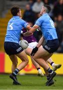 30 April 2022; Michael Fitzsimons and Brian Fenton of Dublin combine to twart Eoghan Nolan of Wexford during the Leinster GAA Football Senior Championship Quarter-Final match between Wexford and Dublin at Chadwicks Wexford Park in Wexford. Photo by Ray McManus/Sportsfile