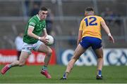 30 April 2022; Paul Maher of Limerick in action against Emmet McMahon of Clare during the Munster GAA Senior Football Championship Quarter-Final match between Clare and Limerick at Cusack Park in Ennis, Clare. Photo by Piaras Ó Mídheach/Sportsfile