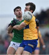 30 April 2022; Josh Ryan of Limerick in action against Cillian Brennan of Clare during the Munster GAA Senior Football Championship Quarter-Final match between Clare and Limerick at Cusack Park in Ennis, Clare. Photo by Piaras Ó Mídheach/Sportsfile