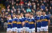 30 April 2022; Conal Kennedy of Tipperary alongside teammates during the national anthem before the Munster GAA Senior Football Championship Quarter-Final match between Waterford and Tipperary at Fraher Field in Dungarvan, Waterford. Photo by Seb Daly/Sportsfile