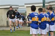 30 April 2022; Tipperary captain Conor Sweeney leads his side out before the Munster GAA Senior Football Championship Quarter-Final match between Waterford and Tipperary at Fraher Field in Dungarvan, Waterford. Photo by Seb Daly/Sportsfile